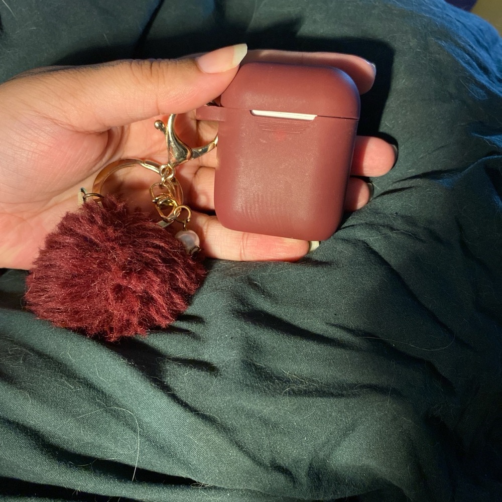 2nd gen AirPods and Burgundy AirPods Case with Pom Pom Keychain